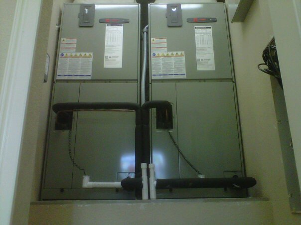 Vertical air handler unit installed indoors